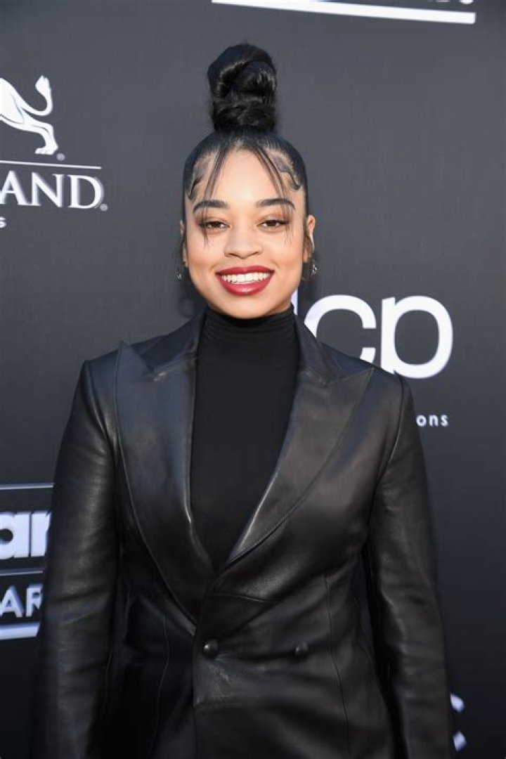 Ella Mai Steps Out With a SkyHigh Sculptural Bun at the Billboard