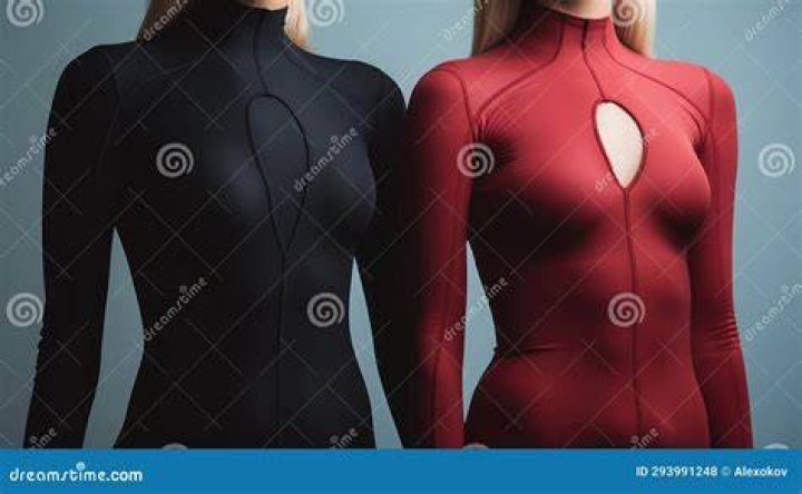 two women in bodysuits are posing for the camera